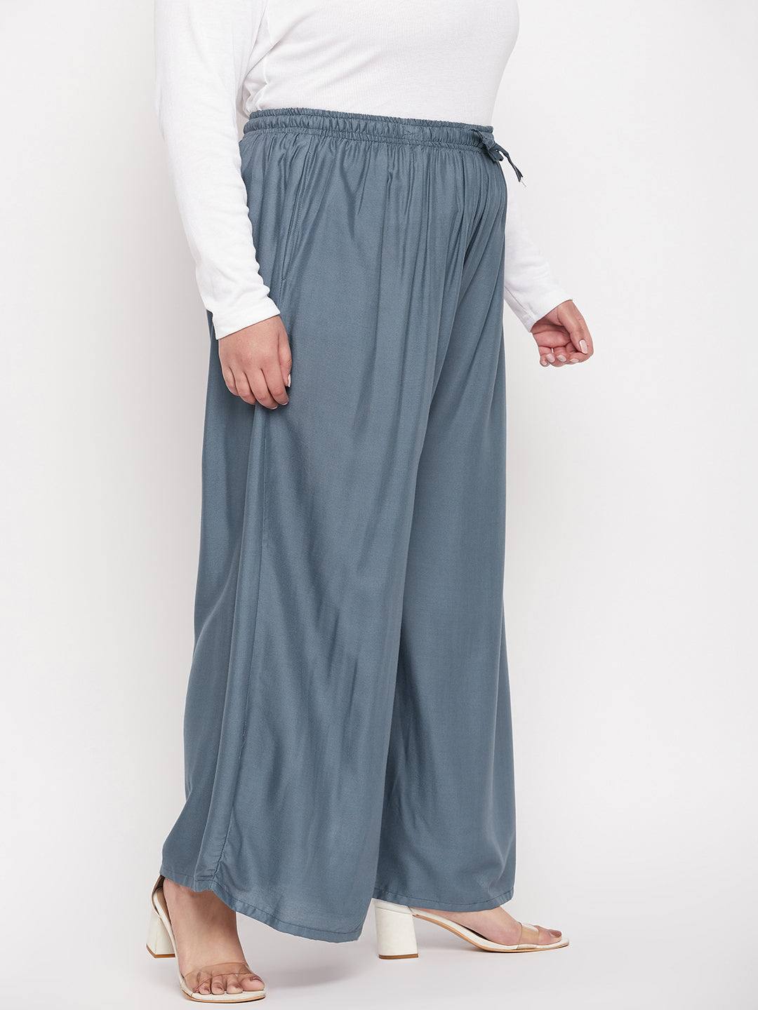Grey solid rayon jumbo sharara with elasticated waistband and drawstring.