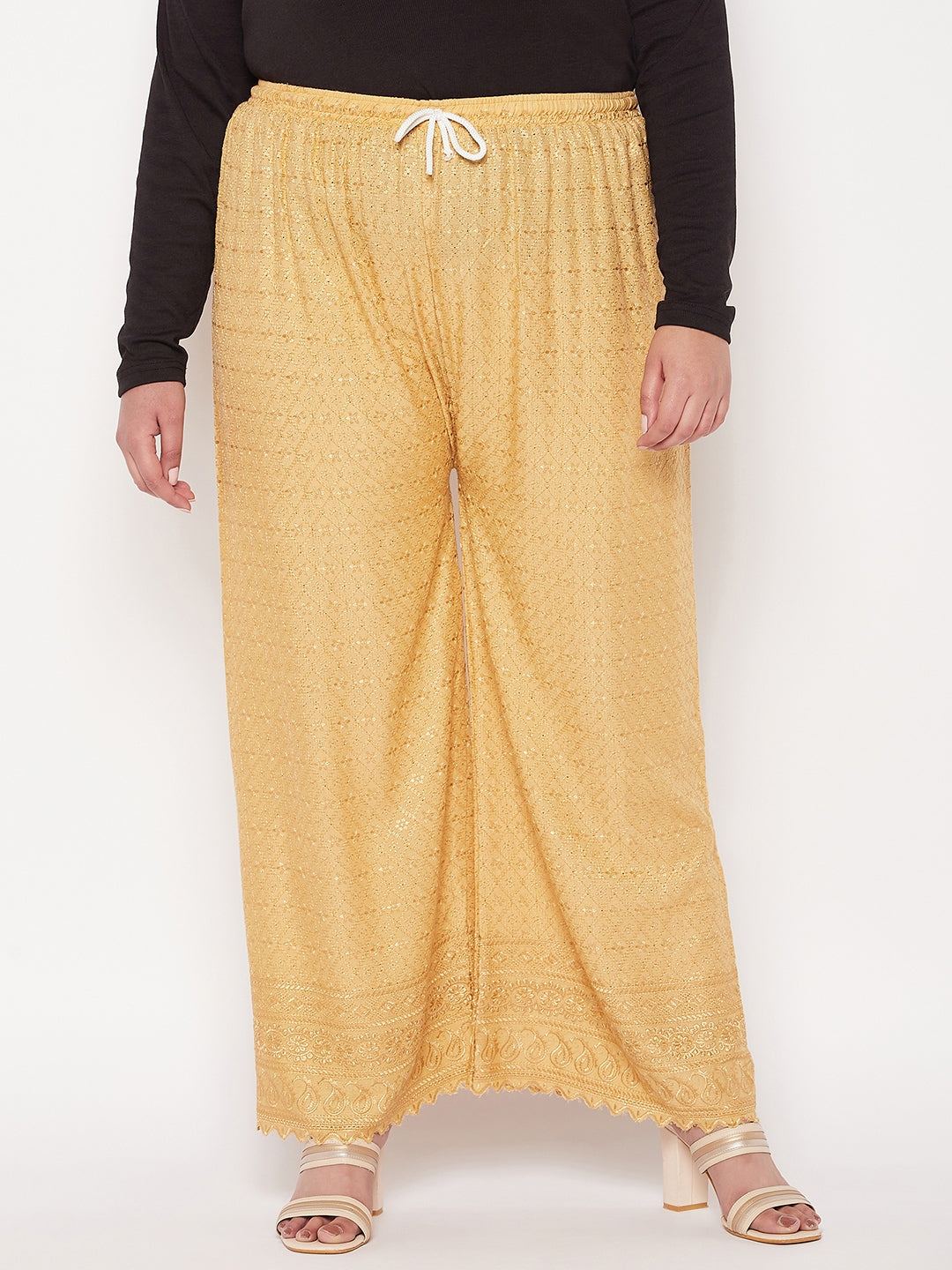 Fawn embroidered rayon palazzo with chikankari design and elasticated drawstring waistband.