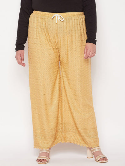 Fawn embroidered rayon palazzo with chikankari design and elasticated drawstring waistband.