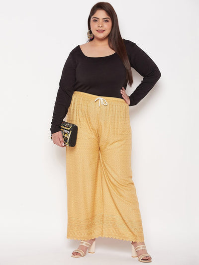 Fawn embroidered Chikankari rayon palazzo with elasticated waistband and drawstring.