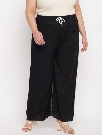 Black embroidered rayon palazzo with elasticated waistband and drawstring.