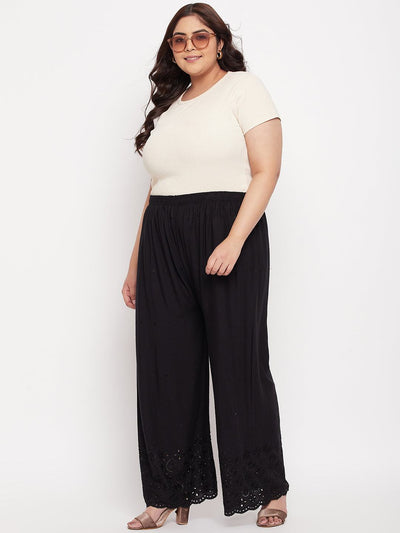 Black embroidered rayon palazzo with Chikankari detailing and elasticated waistband.