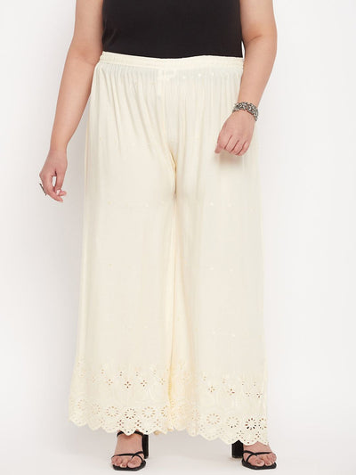 Cream embroidered rayon palazzo with Chikankari design and elasticated waistband.
