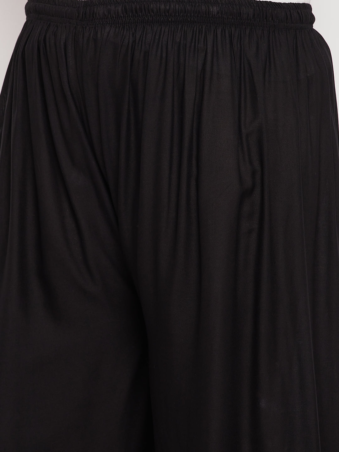 Black Solid Rayon Palazzo with elasticated waistband and drawstring.