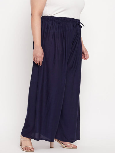 Navy Blue Solid Rayon Palazzo with elasticated waistband and drawstring.