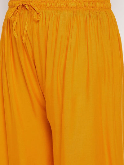 Mustard solid rayon palazzo with elasticated waistband and drawstring.