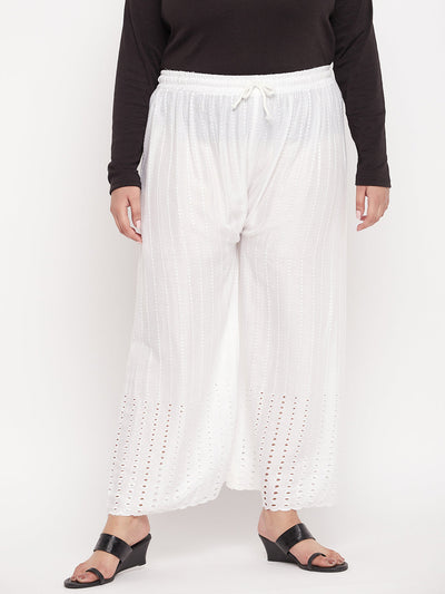 White wide leg rayon palazzo with elastic waistband and drawstring.