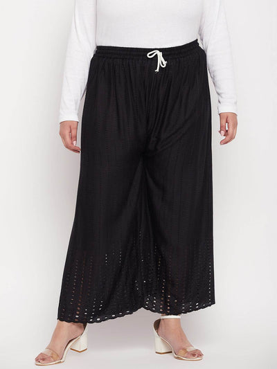Black wide leg rayon palazzo with elasticated waistband and drawstring.