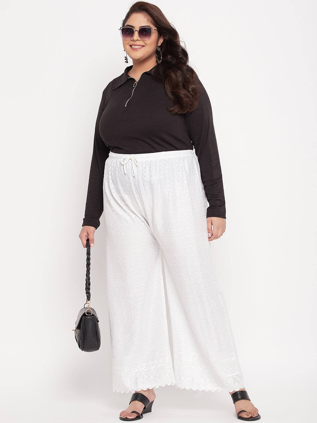 White embroidered Chikankari rayon palazzo with elasticated waistband and drawstring.