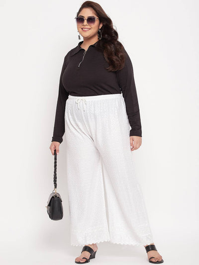 White embroidered Chikankari rayon palazzo with elasticated waistband and drawstring.