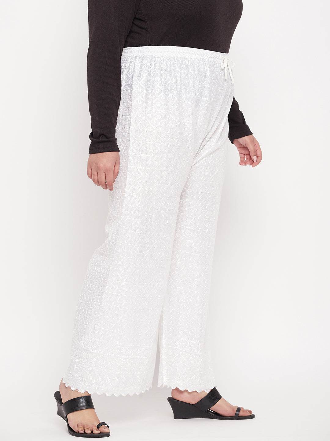 White embroidered rayon palazzo with elasticated waistband.