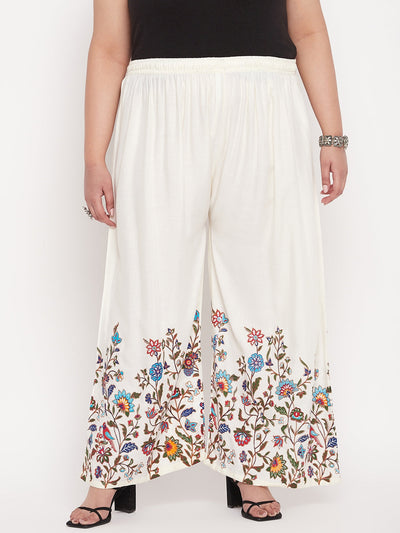 Cream printed rayon palazzo with floral design and elasticated waistband.