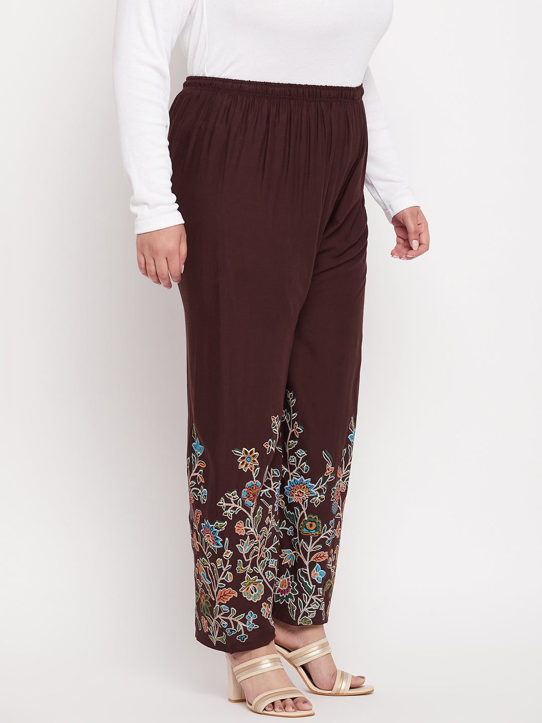 Coffee printed rayon palazzo with floral design and elasticated waistband.