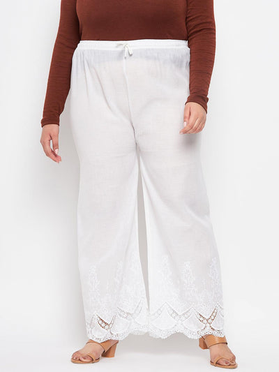 White embroidered cotton straight palazzo with lace hem and elastic waistband.
