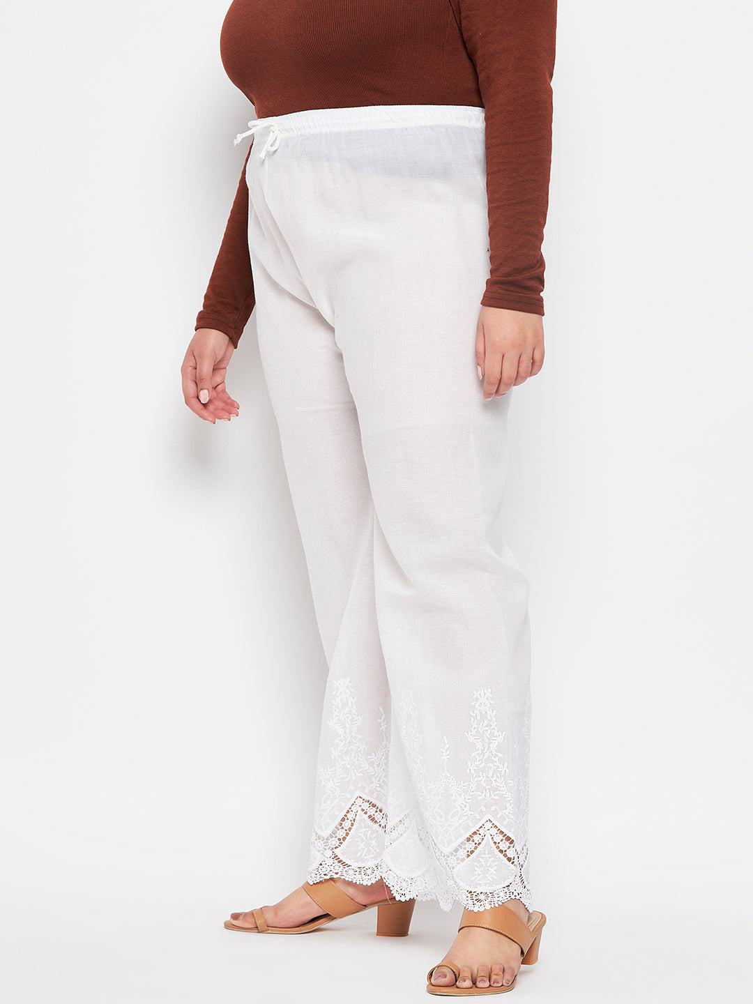 White embroidered cotton straight palazzo with lace hem and elastic waistband.