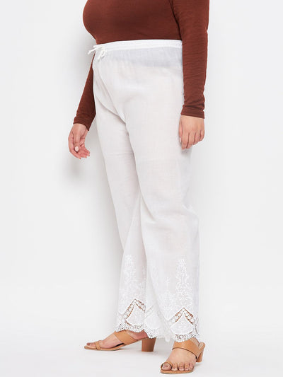 White embroidered cotton straight palazzo with lace hem and elastic waistband.
