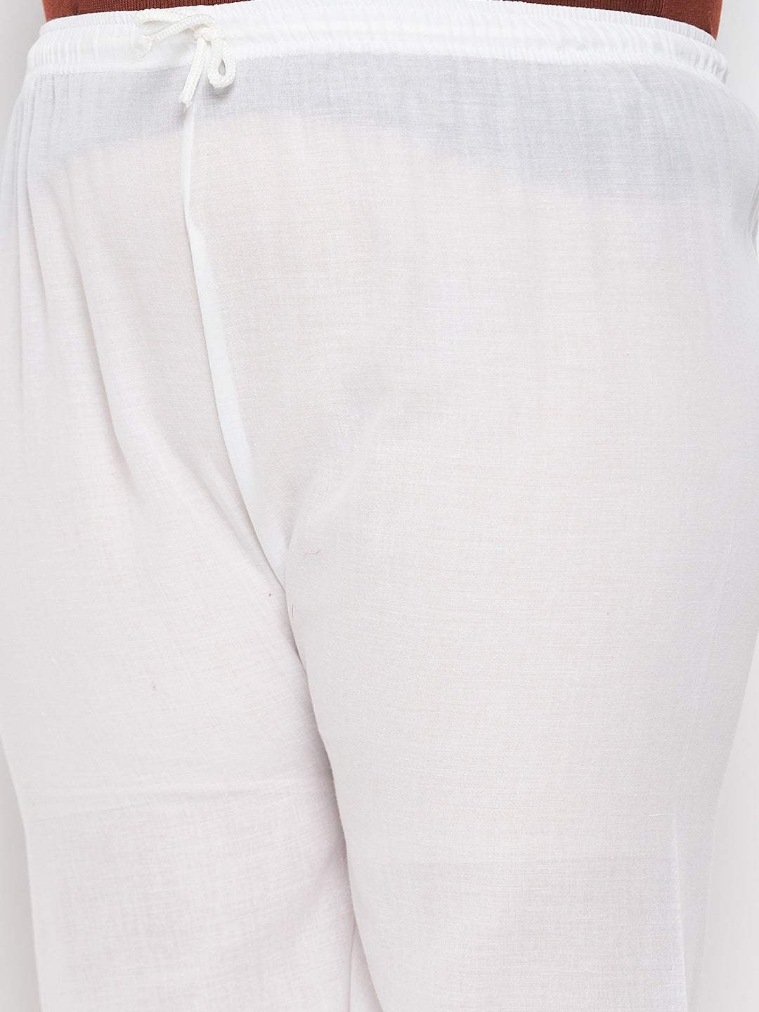 White embroidered cotton straight palazzo with elastic waistband.