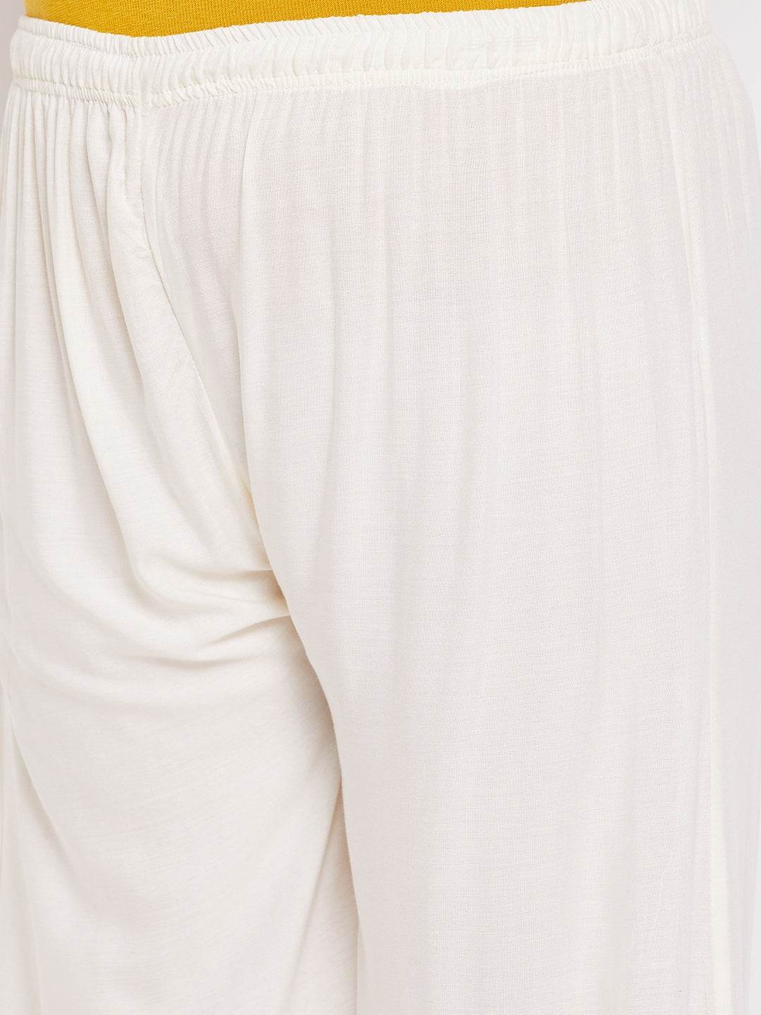 Cream mirror work rayon sharara with elasticated waistband and drawstring.