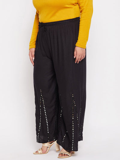 Black mirror work rayon sharara with elasticated waistband and drawstring.