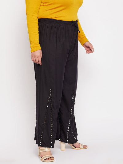 Black mirror work rayon sharara with elasticated waistband and drawstring.