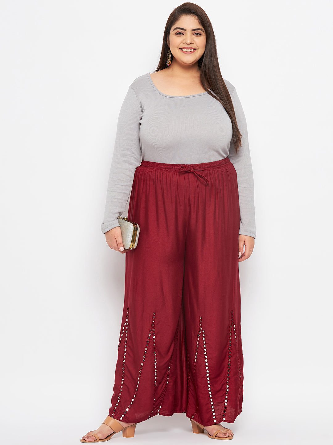 Maroon mirror work rayon sharara with elasticated waistband and drawstring.