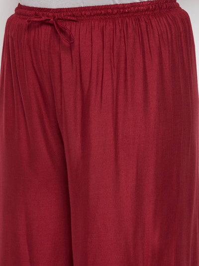 Maroon mirror work rayon sharara with elasticated waistband and drawstring.