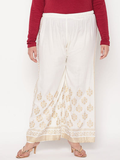 Cream printed rayon palazzo with elasticated waistband and drawstring.