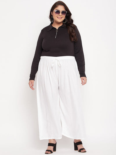 White solid rayon palazzo with elasticated waistband and drawstring.