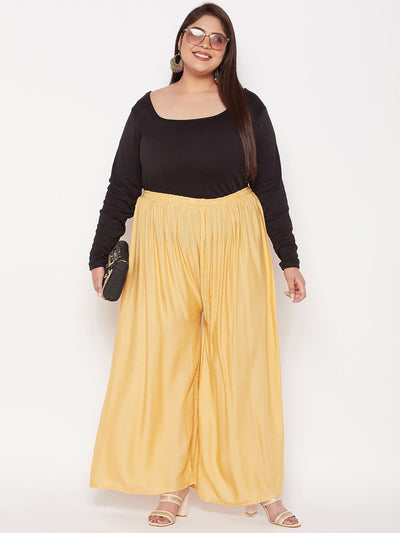 Fawn solid rayon palazzo with elasticated waistband and drawstring.
