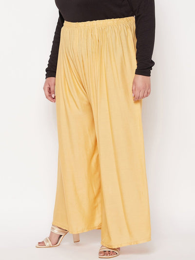 Fawn solid rayon palazzo with elasticated waistband and drawstring.