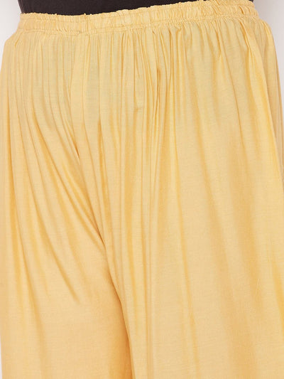 Fawn solid rayon palazzo with elasticated waistband and drawstring.
