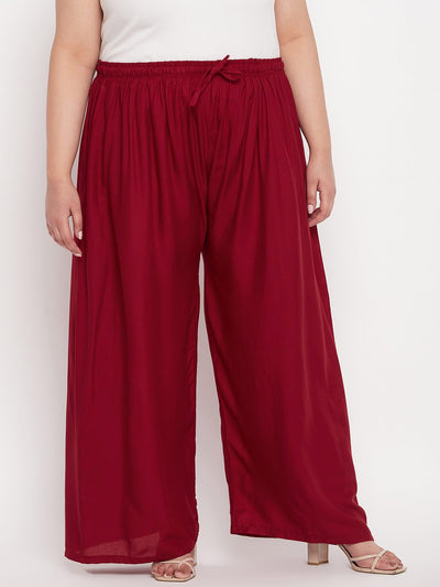 Maroon solid rayon palazzo with elasticated waistband and drawstring.