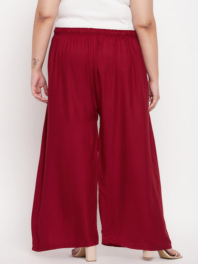 Maroon solid rayon palazzo with elasticated waistband and drawstring.