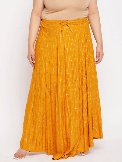 Mustard printed flared maxi skirt with drawstring waistband.