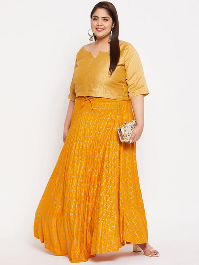 Mustard printed flared maxi skirt with drawstring waistband.