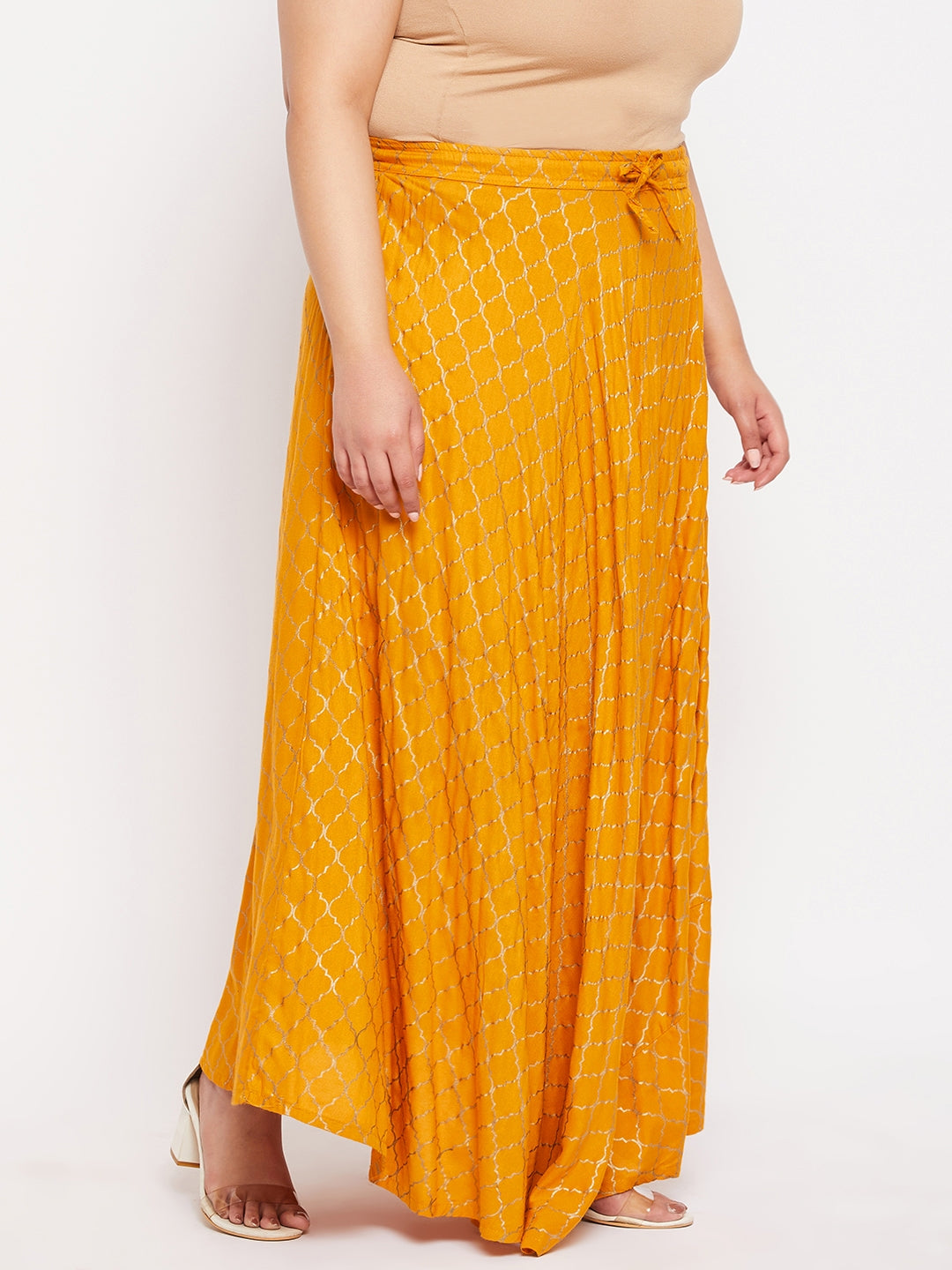 Mustard printed flared maxi skirt with drawstring waistband.