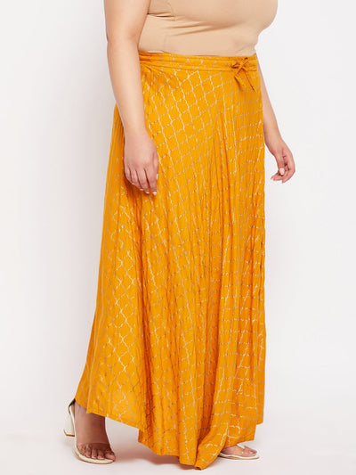 Mustard printed flared maxi skirt with drawstring waistband.