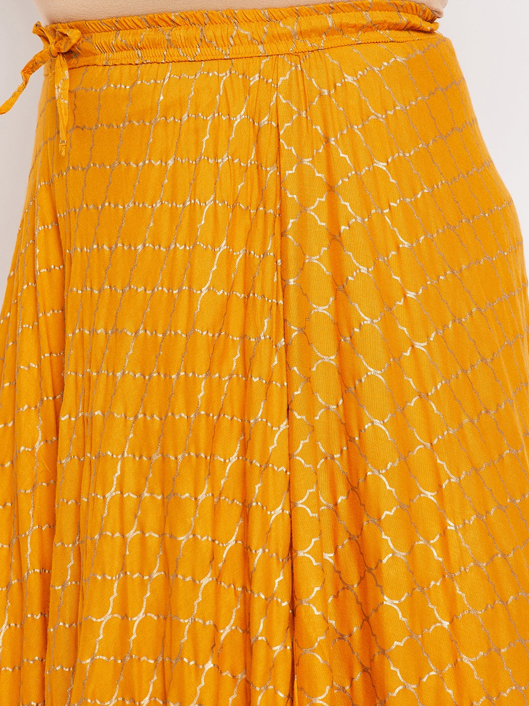 Mustard printed flared maxi skirt with drawstring waistband.