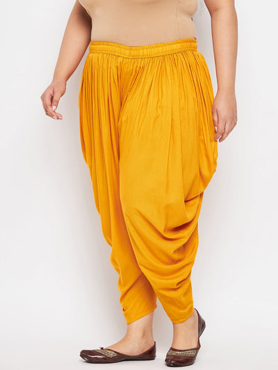 Mustard solid rayon dhoti salwar with elasticated waistband and drawstring.