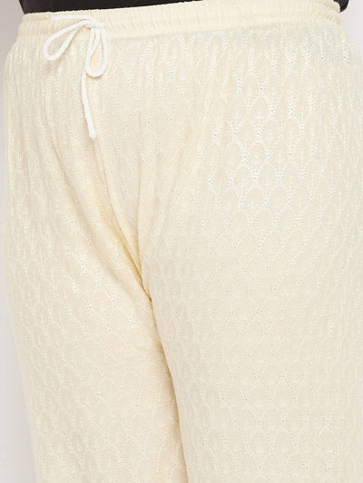 Cream embroidered rayon palazzo with elasticated waistband and drawstring.