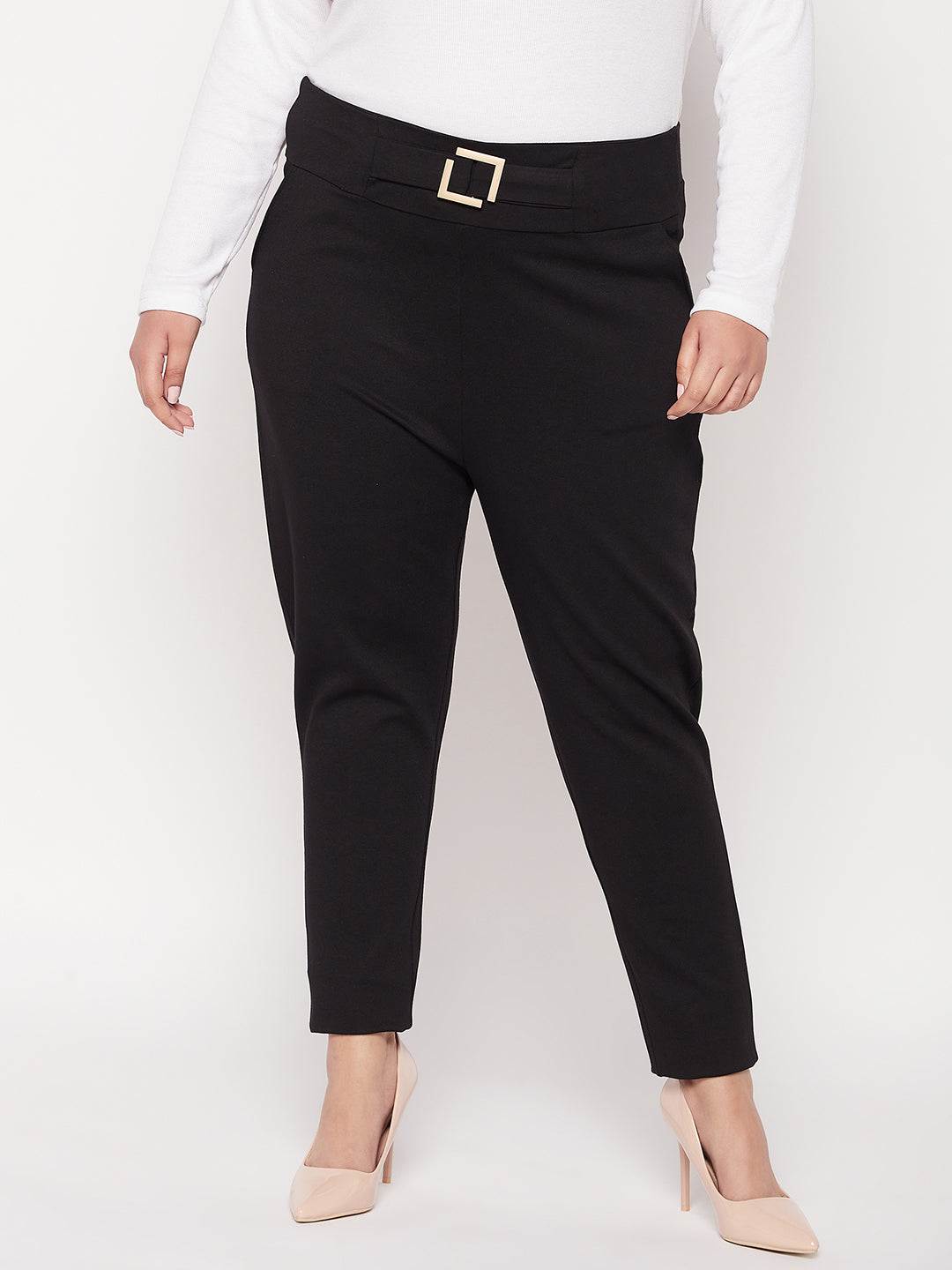 Black solid regular fit jegging made from NR Roma fabric for style and comfort.