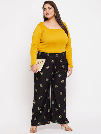 Black printed rayon palazzo with elastic waistband and drawstring.