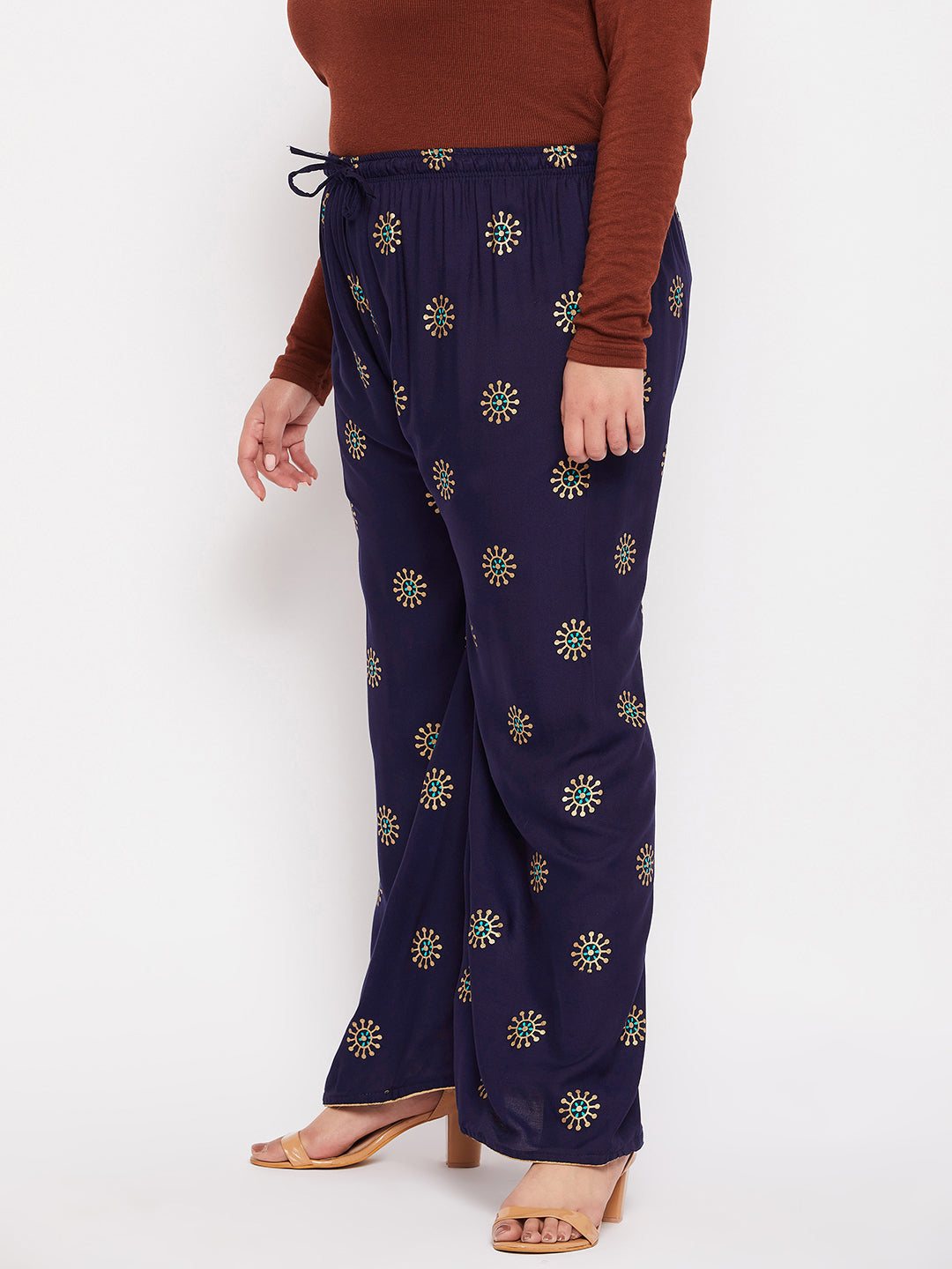 Navy blue printed rayon palazzo with elasticated waistband and drawstring.