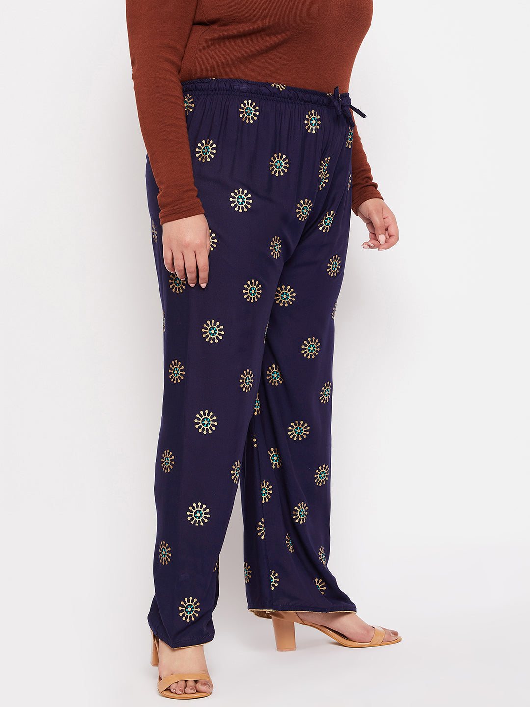 Navy blue printed rayon palazzo with elasticated waistband and drawstring.