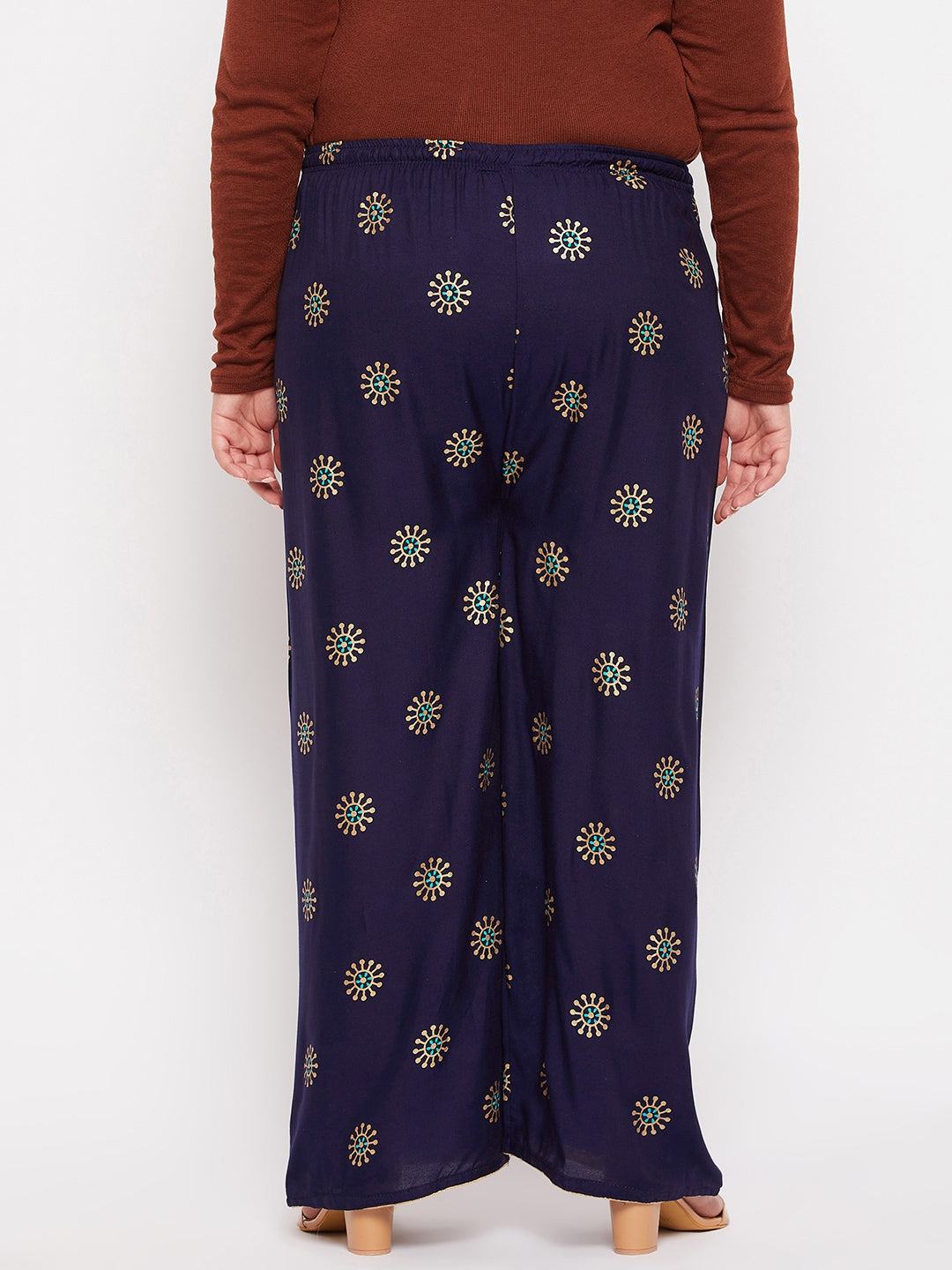 Navy blue printed rayon palazzo with elastic waistband and drawstring.
