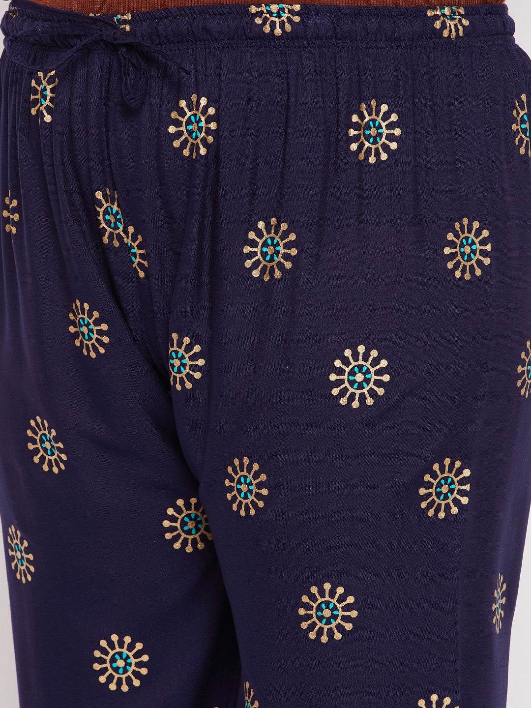 Navy blue printed rayon palazzo with elastic waistband and drawstring.