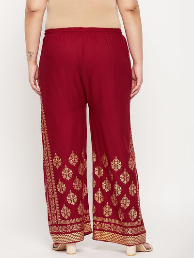 Maroon printed rayon palazzo with elasticated waistband and drawstring.