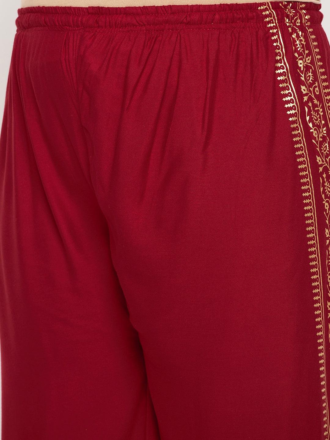 Maroon printed rayon palazzo with elasticated waistband and drawstring.