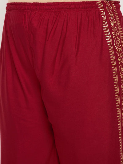 Maroon printed rayon palazzo with elasticated waistband and drawstring.