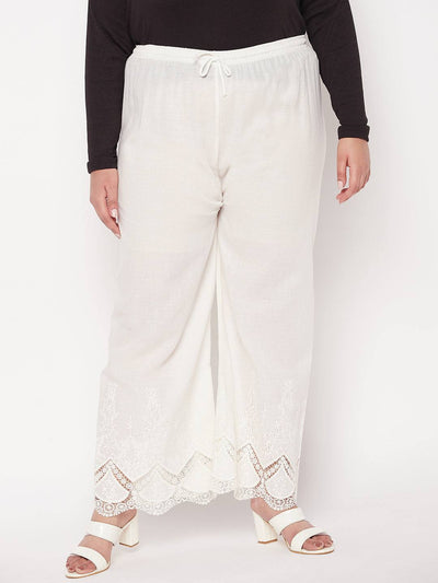 Cream embroidered cotton straight palazzo with lace hem and elastic waistband.